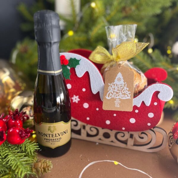 Borsetta di Natale in panno con mini panettone e bottiglietta di prosecco